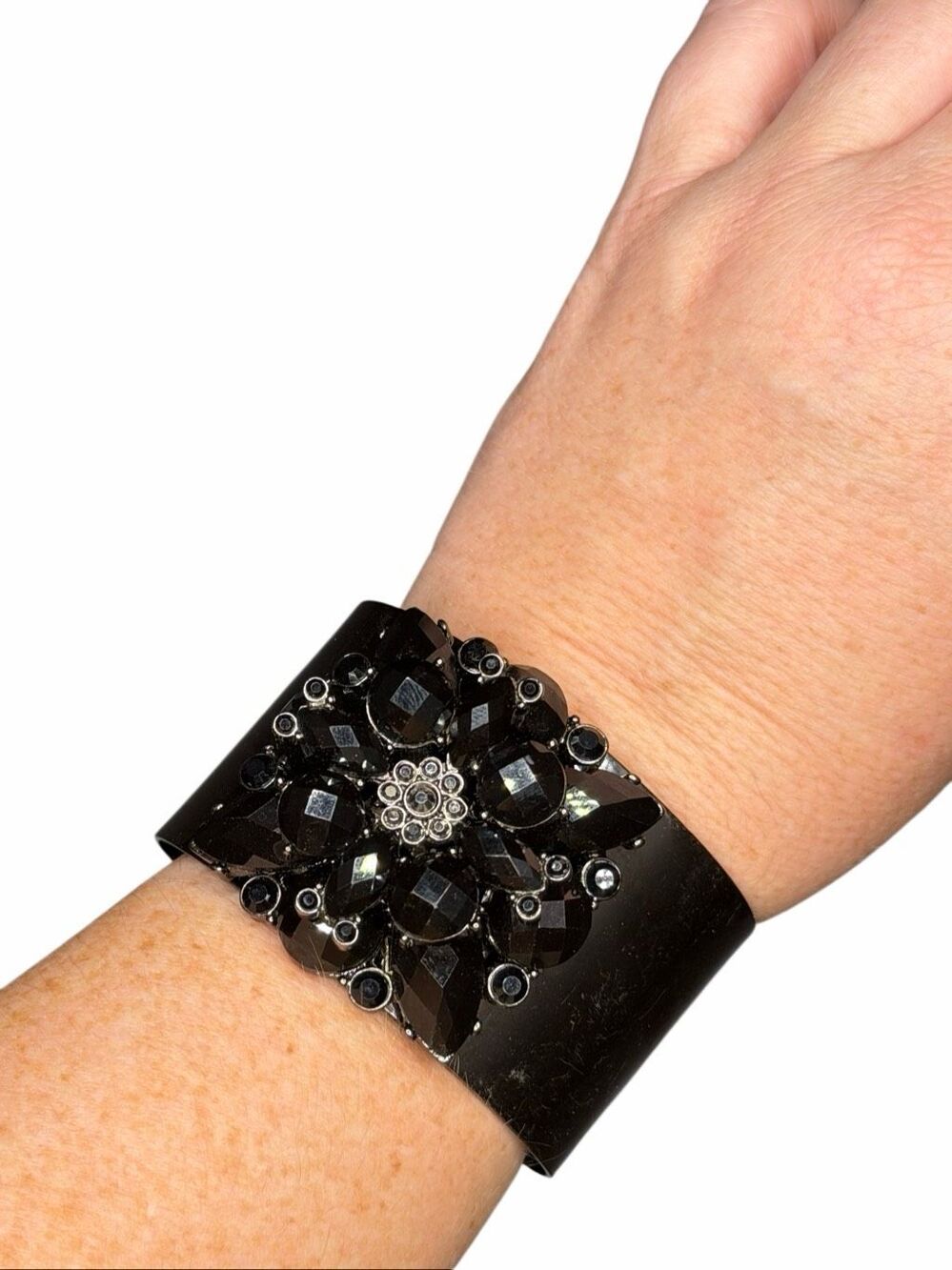 Nordstrom metal cuff with black crystal floral design
